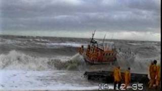 RNLI lifeboat launch in rough sea [upl. by Enihsnus]