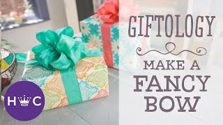 How to Make a Fancy Bow  Giftology [upl. by Nnep]